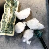 Pictured are the 58.6 grams of meth and crack pipe seized during a traffic stop. ( Courtesy photo)