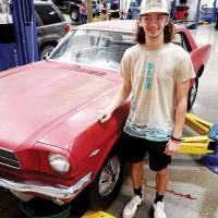 A.J. Smith of Yukon stands beside his 1966 Ford Mustang