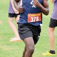 Abraham Scarritt runs over the first loop of the course at the 2025 Bethany Invitational