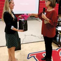 Shannon Statton presents Alissa Patterson with a gift