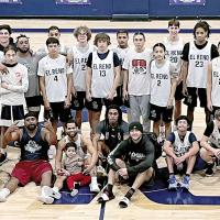 Pictured is a group of current and former players