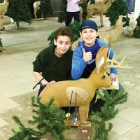 Boys with archery target