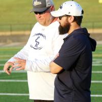Chuck Atchison, left, talks with Jeff Kline