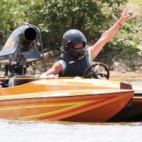 Matt Miller points to the cheering crowds before his first preliminary round run