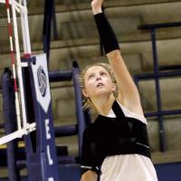 Bailey Denwalt tips a shot with her left hand during a recent practice