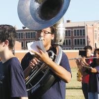 Eliaz Limpy keeps a close eye on instruction from band director Shane Johnston