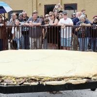 The crowd around the cooking arena was two to three layers deep