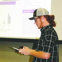 Cayden Buckner uses a radio-controlled remote