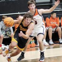 Okarche’s P.K. Harris drives around Calumet's Dalton Belcher