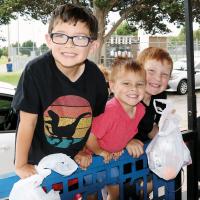 Bryson, Cameron and Korbin Mize are all smiles