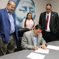 Gov. Reggie Wassana signs documents placing land in Geary into trust
