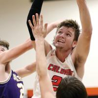 CHS vs OHS boys basketball_Snowden slides between field of swiping arms
