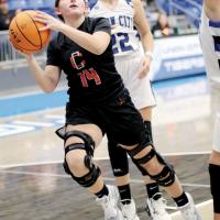 McKinley Stilley eyes the basket after splitting two Union City defenders