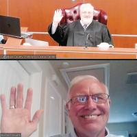 Richard Younts is sworn in by Judge Bob Hughey