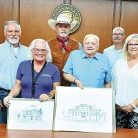 Harold Shaver presents a gift of artwork produced by Marie Hirst