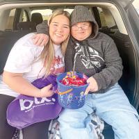 Former Teen Board president Laney Liebl with resident Kyle