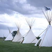 Traditional tipis set up at Crimson Creek Golf Course