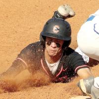 Brendon Voss slides headfirst into third base