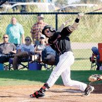 Brendon Voss slaps the ball down the third-base line