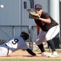 Hunter Havanick eyes a pickoff throw into his glove