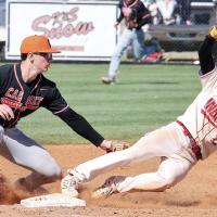 Wyatt Cox reaches out to tag a Vici runner