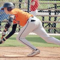 Talon Arnold drops down a bunt