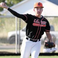 Kingston Arnold turns to make a pickoff throw