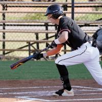 Kyler Thiessen drops down a bunt attempt