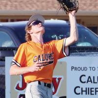 Hunter Mayfield runs under a pop fly