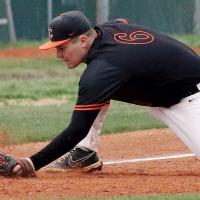 Carson Cooper reaches out to tag a Southwest Covenant School base runner