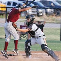 Carson Cooper tags out a runner