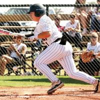 Jackson Burns drops down a bunt