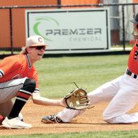 Gavin Tinsley eyes a pickoff throw to second base