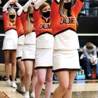 Calumet High School cheerleaders hold a pose during a recent basketball game