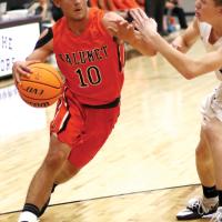 CHS boys basketball_Nitzel drives by
