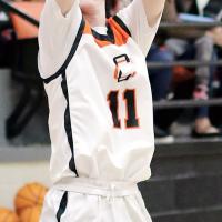 Kyler Thiessen shoots a 3-pointer