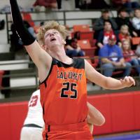 Dylan Walling reaches up for a rebound