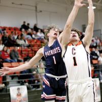 Brendon Voss battles for a rebound with a Southwest Covenant player