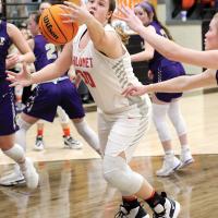 CHS girls basketball_Ray reaches out for rebound 