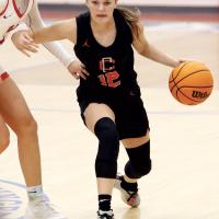 Brie Myers dribbles past a defender