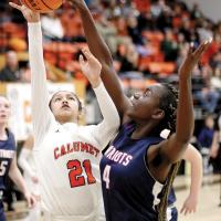 Angellyne De La Cruz shoots a jumper in front of a Southwest Covenant player