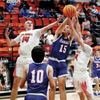 Matt Snyder and Caleb Meschberger battle for a rebound