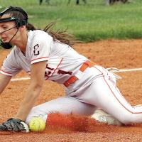  Andrea Lock has the ball bounce out of her glove after hitting the ground