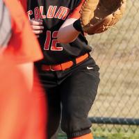 Audrey Gathers eyes a throw toward first base