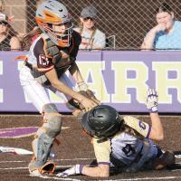 Calumet catcher Angie De La Torre tags out Okarche base runner Ava Meier at the plate