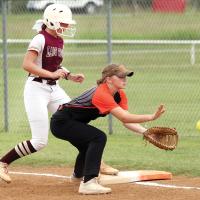 Presley Stilley eyes a pickoff throw 