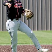 Kyler Thiessen makes a throw across the infield