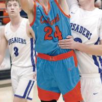 David Walling gets grabbed while shooting under the goal