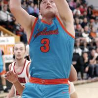 Dalton Belcher shoots in the Chieftains regional playoff game with Dover