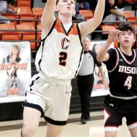 Kyler Thiessen shoots the layup which pushed the guard over the 1,000-point career scoring plateau